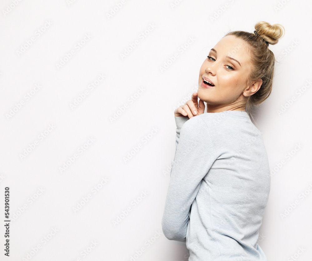 Skincare and makeup concept. Close-up of young blond woman showing glowing skin with natural makeup Skincare and makeup concept. Close-up of young blond woman showing glowing skin with natural makeup