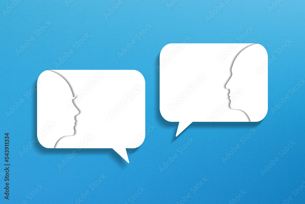 Dialog concept. Speech bubbles with two faces on blue background. Dialog concept. Speech bubbles with two faces on blue background.