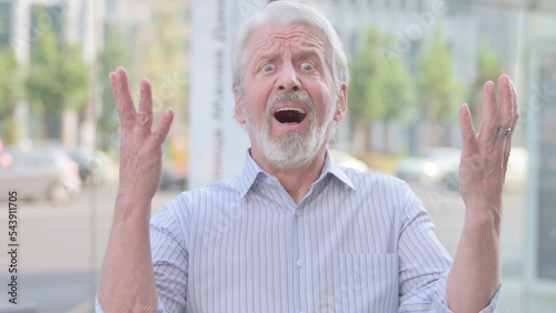 Portrait of Angry Old Man Screaming Outdoor