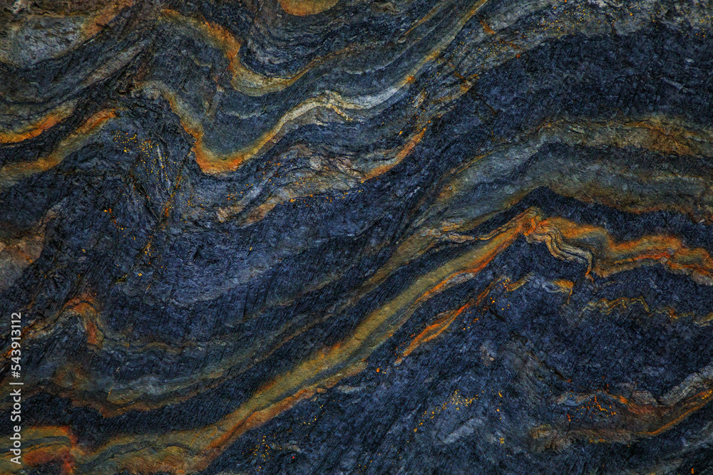 Naklejka premium Rocky shapes on the beach. textures and patterns generated on the stones of the Asturian beaches