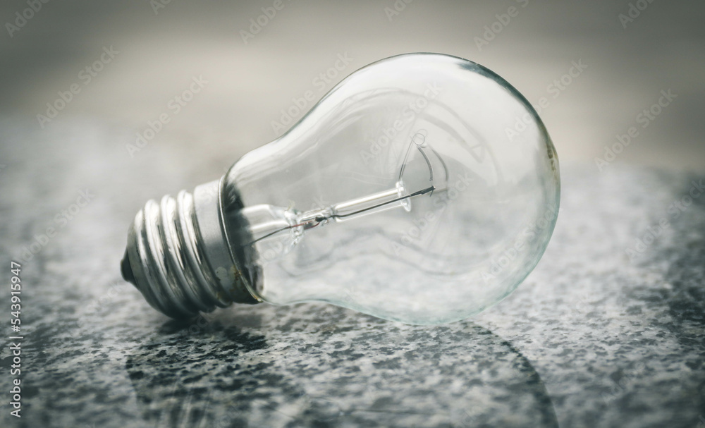 An Incandescent light bulb during the day An Incandescent light bulb during the day