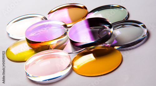 Spectacle lenses with anti-reflective and photochromic coating.