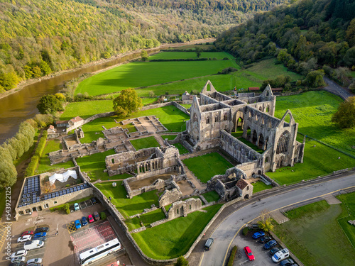 Aerial view of an ancient ruined cistercian monastery (Tintern Abbey, Wales. Built circa 12th century AD) photo
