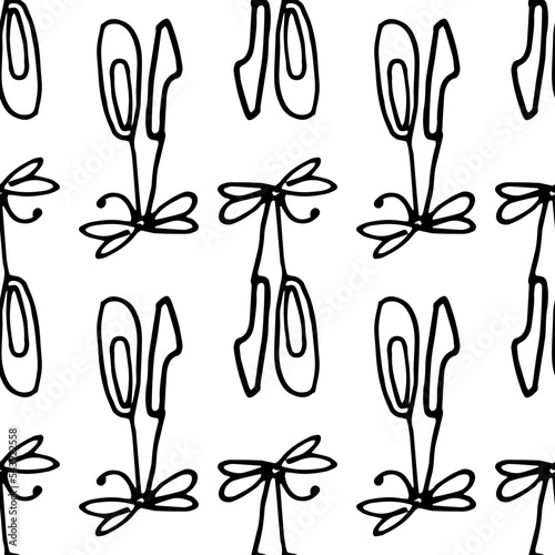 pattern of a pair of ballet flats on a ribbon with a black line on white. Seamless pattern of children's pointe shoes tied with a bow, hand-drawn in the style of a doodle with a black insulated line f
