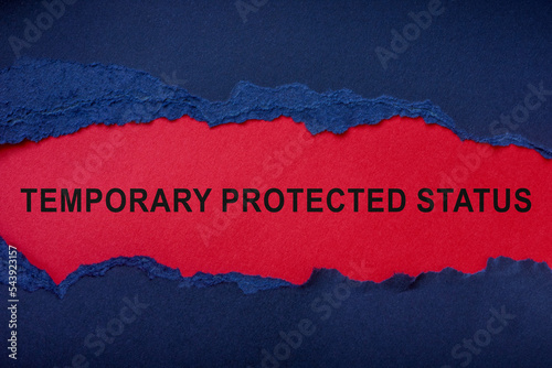 Tablou pe pânză Temporary protected status inscription on a red sheet and a torn piece of paper