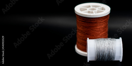 threads, threads on a black background, black background, beautiful background, reel of thread on black, spools of thread on a white background