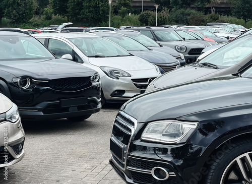 View of many different cars in parking lot