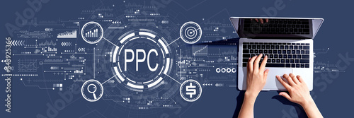 PPC - Pay per click concept with person using a laptop computer