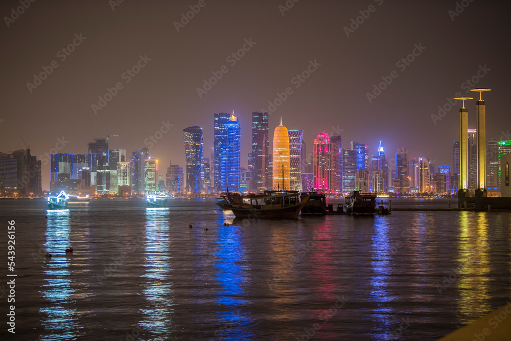 Obraz premium Doha, Qatar- December 23,2019 : Night view of Skyline, Doha's Financial District (West Bay).