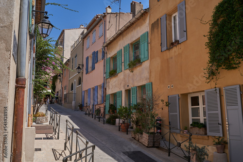 Fototapeta Naklejka Na Ścianę i Meble -  Saint Tropez, France - August 8, 2022 - the narrow streets and squares of the world-famous French town on a summer afternoon