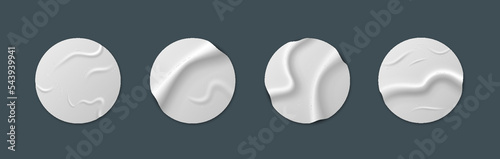 White paper round adhesive stickers mock up isolated. Crumpled round sticky label with glued effect