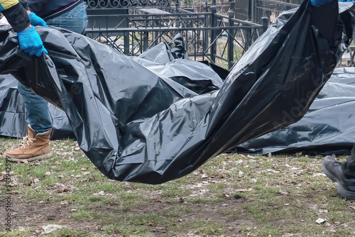 A bag with the corpse of a civilian killed by the Russian army. Bucha. photo