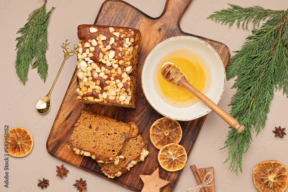 Fototapeta premium Traditional french spice gingerbread cake with honey, ginger, cinnamon, nutmeg and annis. Christmas dessert, festive sweet food for winter holidays celebration