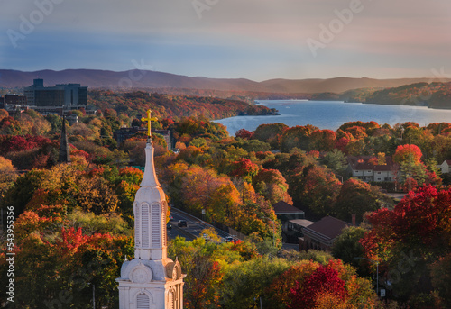 An Autumn view of Poughkeepsie, NY from Cantilever bridge in Walkway Over the Hudson State Historic Park with the Hudson river in the background