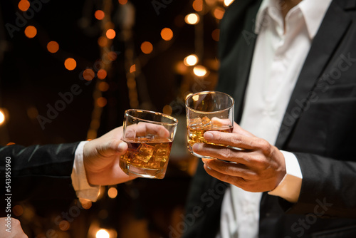 Canvas Print Celebrate whiskey on a friendly party in  restaurant