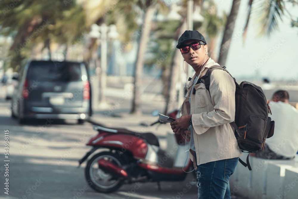 Tourists hold maps to find attractions, restaurants or hotels. backpacker and travel concept. Tourists hold maps to find attractions, restaurants or hotels. backpacker and travel concept.