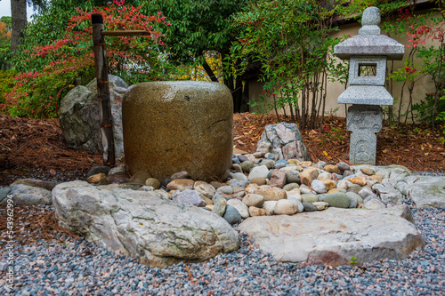 Stone Lateran And Fountain In Garden 