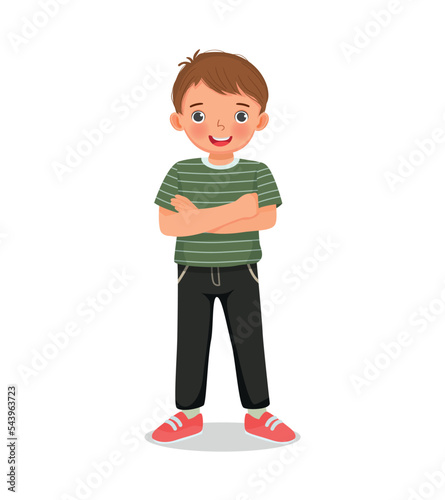 cute little boy standing with arms crossed pose