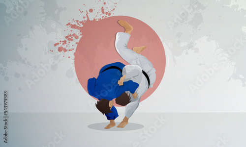 A wrestler in a blue kimono makes a throw. Judo eastern wrestling.