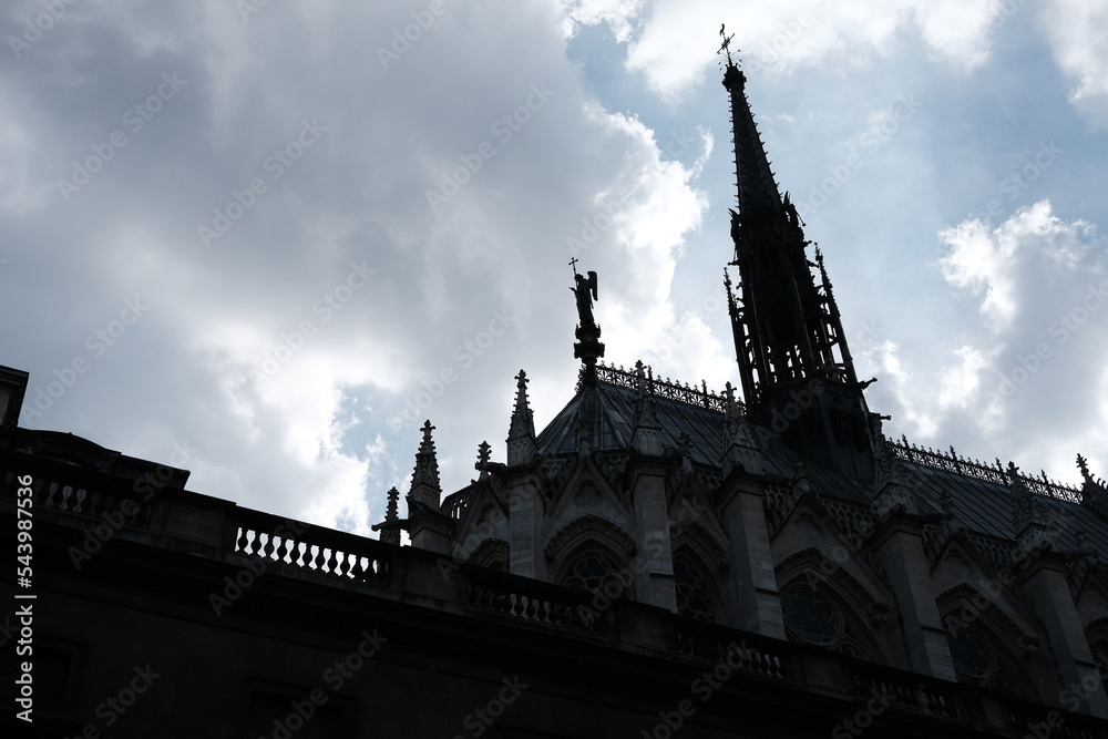 Silhouette of Sainte-Chapelle in the Cloudy Day. It is a Amazing Gothic Chapel where is a Famous Landmark of Paris, France.