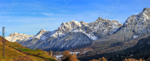 Swiss Alps mountain peaks in the Lower Engadin in Canton Grisons: Piz Ajuez, Piz Lischana, Piz San Jon Dadora and connecting mountain chains photo