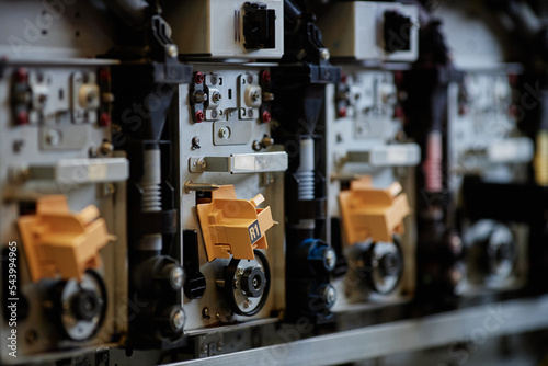 Close up background image of complex printing machine parts in industrial shop, copy space