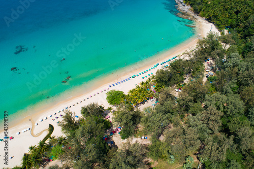 Aerial view of amazing beach with people relax on the beach sea, Beautiful Surin beach Phuket Thailand, Amazing sea beach sand tourist travel destination in andaman sea, Travel and tour concept