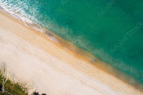 Aerial view top view of beach Phuket Thailand, Amazing sea beach sand tourist travel destination in andaman sea, Beautiful beach in phuket island, Travel and tour concept background