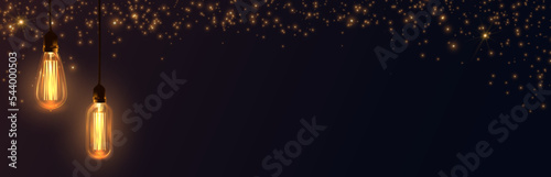 Foto Background with warm light Edison light bulbs and golden glitter.