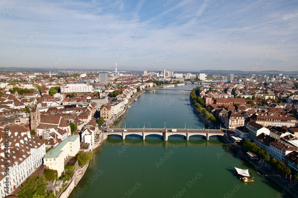 Aerial view of City of Basel with Rhine River and Middle Rhine Bridge on a sunny summer day. Photo taken August 24th, 2022, Basel, Switzerland.