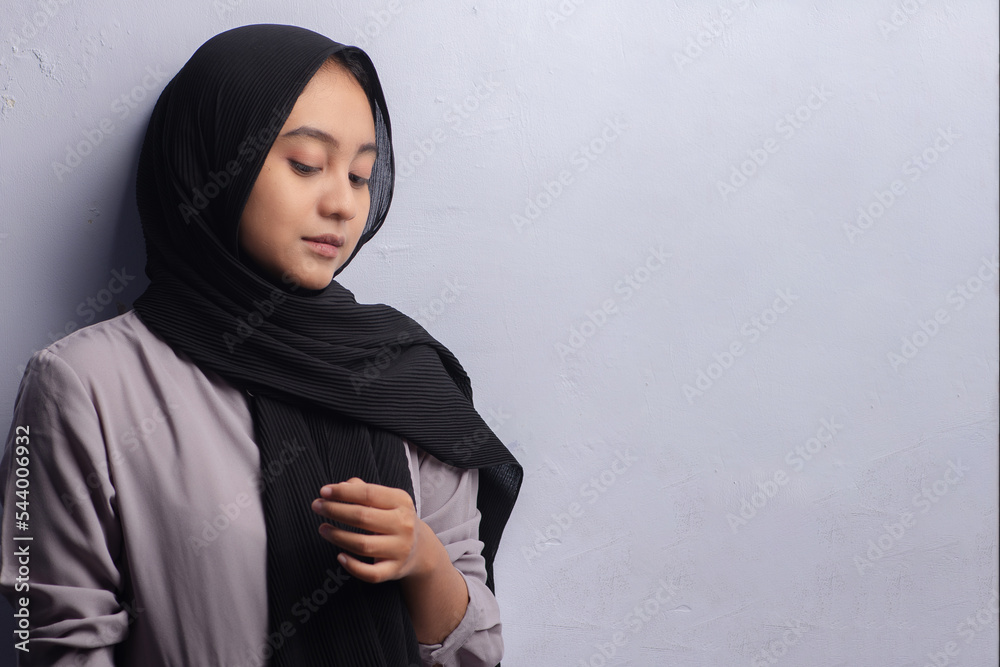 Woman Wearing a Hijab Isolated on White Background Woman Wearing a Hijab Isolated on White Background