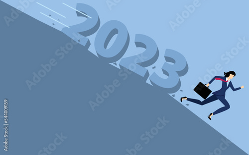 Businesswoman running downward to avoid the year 2023 that slipping down