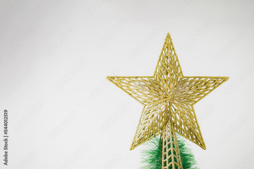 Golden star on christmas tree Golden star on christmas tree