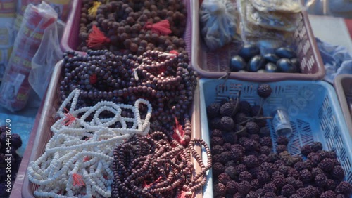 To sell and Hanging Rudraksha Mala prayer beads Shop in somewere an indian market photo