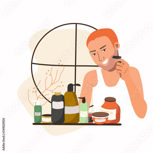 A redhead man shaves with a machine, makes cosmetic procedures for skin care, vector illustration,
enjoying a skincare routine. Men's hygiene.