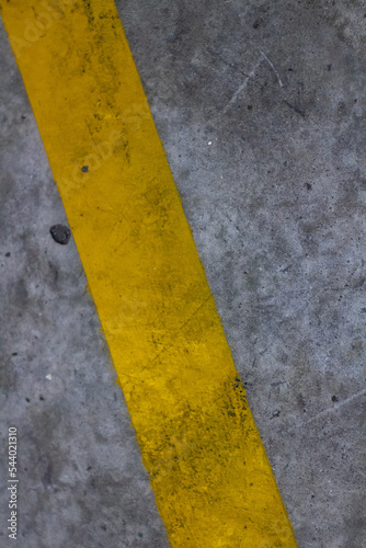 Yellow lines abstract shapes on the floor © OYeah