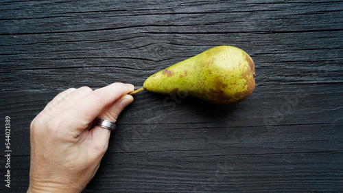 pear in hand