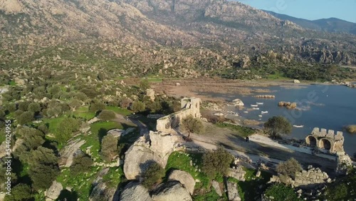 Aerial view of Lake Bafa is a lake and a nature reserve as well as the ruins of Heraclea by Latmus, Turkey photo