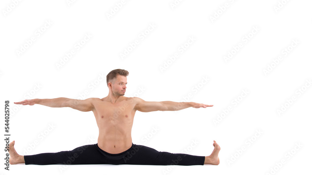 A cool stretch from an attractive athletic guy. White background.
