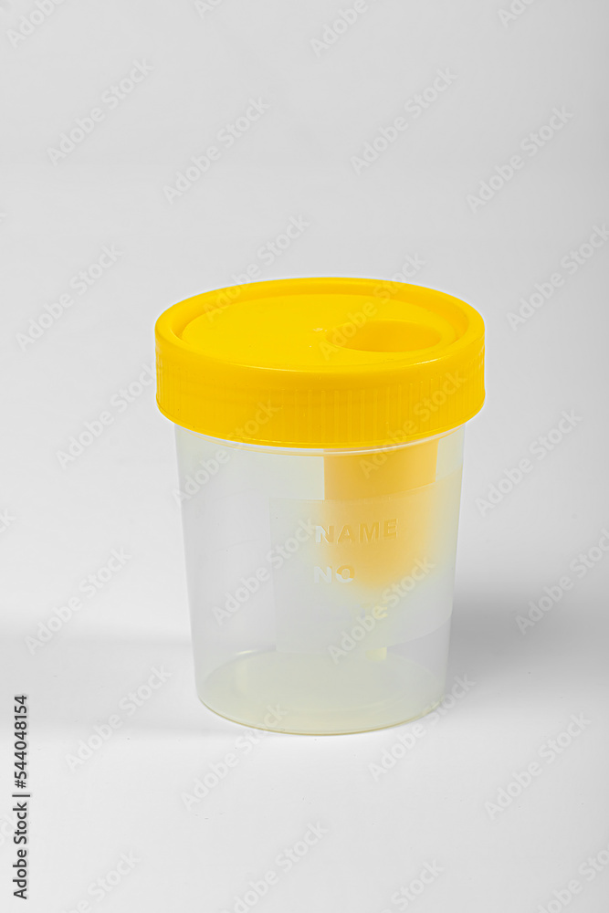 Plastic container for collecting medical tests on a white background. Plastic container for collecting medical tests on a white background.