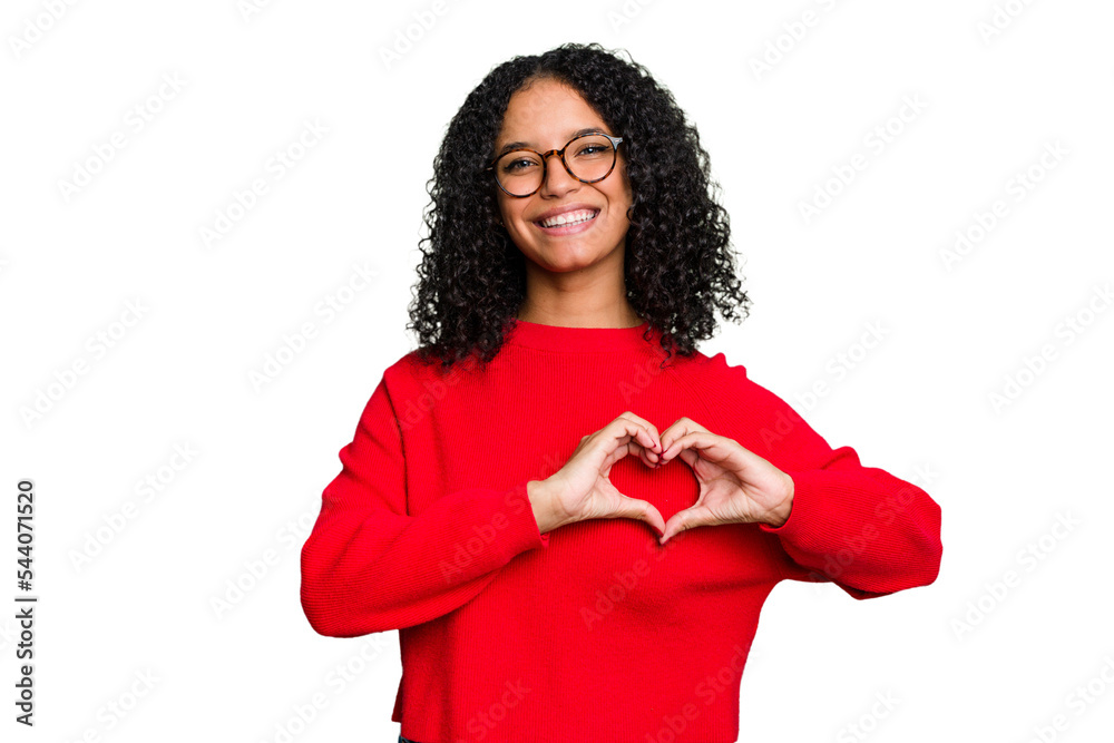 Young cute brazilian woman isolated smiling and showing a heart shape with hands. Young cute brazilian woman isolated smiling and showing a heart shape with hands.