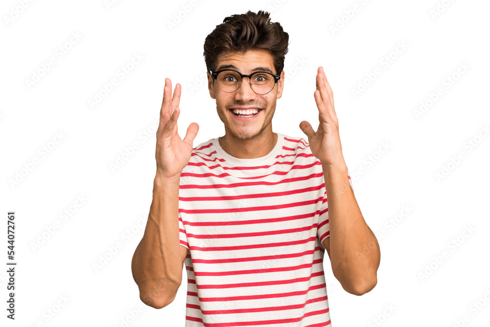 Young caucasian handsome man isolated laughs out loudly keeping hand on chest. Young caucasian handsome man isolated laughs out loudly keeping hand on chest.