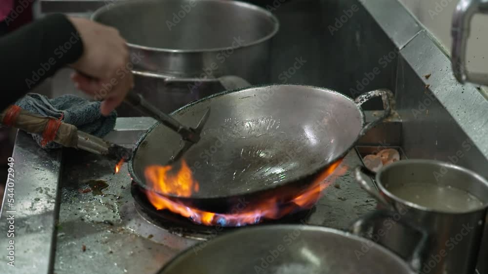 Cleaning Cooking a Burning Hot Wok with Flames Water and Oil, Asian Chinese Thai Wok Cooking Technique, Slow Motion Cleaning Cooking a Burning Hot Wok with Flames Water and Oil, Asian Chinese Thai Wok Cooking Technique, Slow Motion