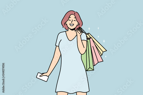 Happy young woman with bags excited with shopping in mall or store. Smiling girl overjoyed with purchases. Consumerism concept. Vector illustration. 