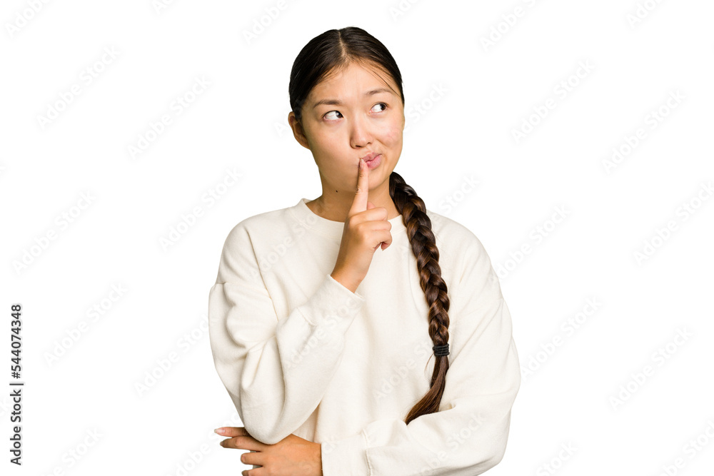 Young Asian woman isolated looking sideways with doubtful and skeptical expression. Young Asian woman isolated looking sideways with doubtful and skeptical expression.