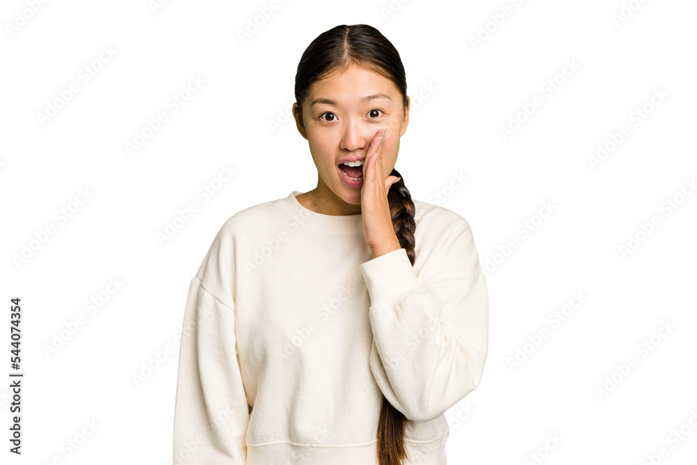 Young Asian woman isolated shouts loud, keeps eyes opened and hands tense. Young Asian woman isolated shouts loud, keeps eyes opened and hands tense.