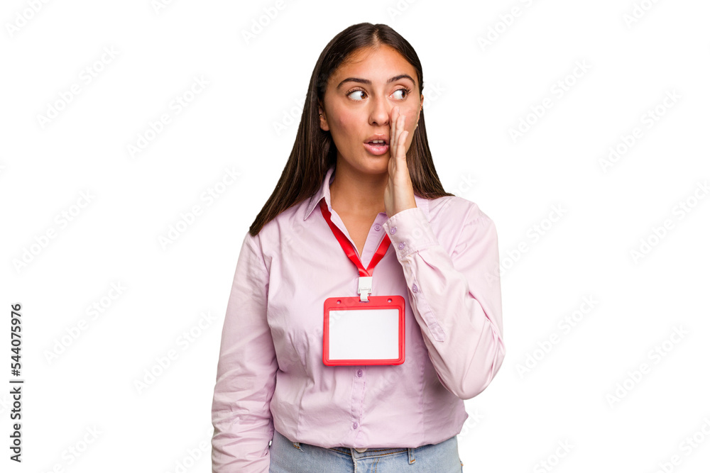 Young caucasian woman with a badge isolated is saying a secret hot braking news and looking aside Young caucasian woman with a badge isolated is saying a secret hot braking news and looking aside