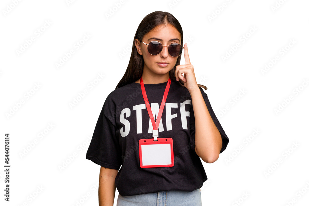 Young caucasian staff woman wearing a badge isolated pointing temple with finger, thinking, focused on a task. Young caucasian staff woman wearing a badge isolated pointing temple with finger, thinking, focused on a task.