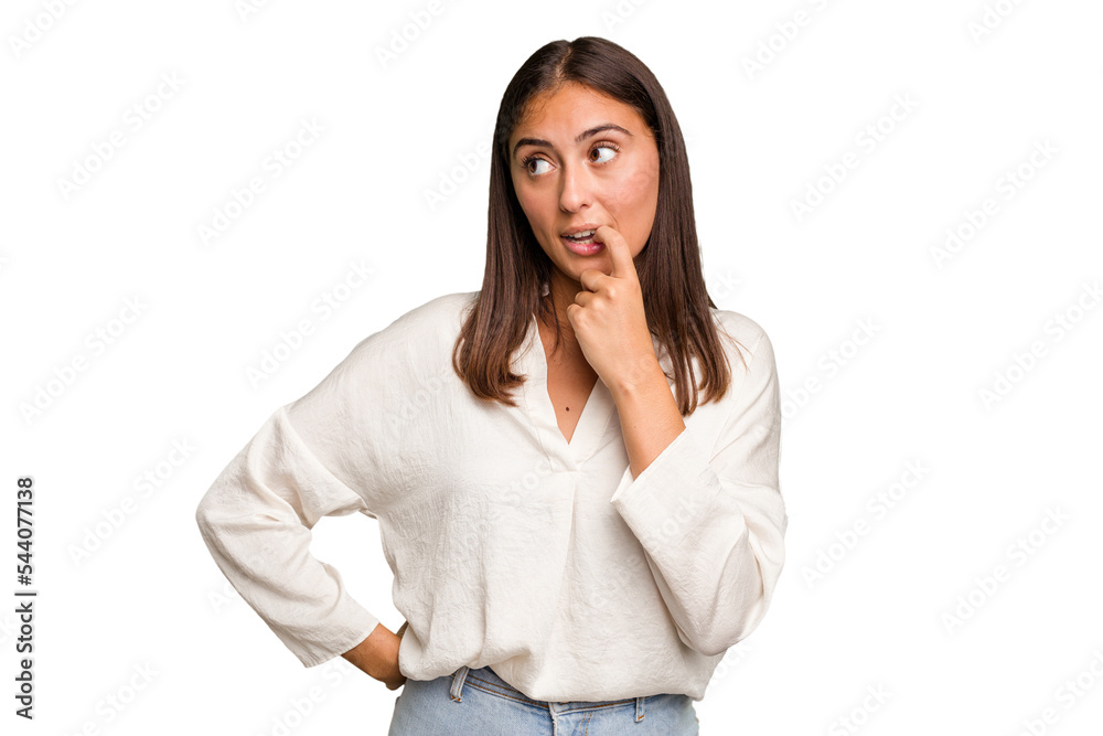 Young cute caucasian woman isolated relaxed thinking about something looking at a copy space. Young cute caucasian woman isolated relaxed thinking about something looking at a copy space.