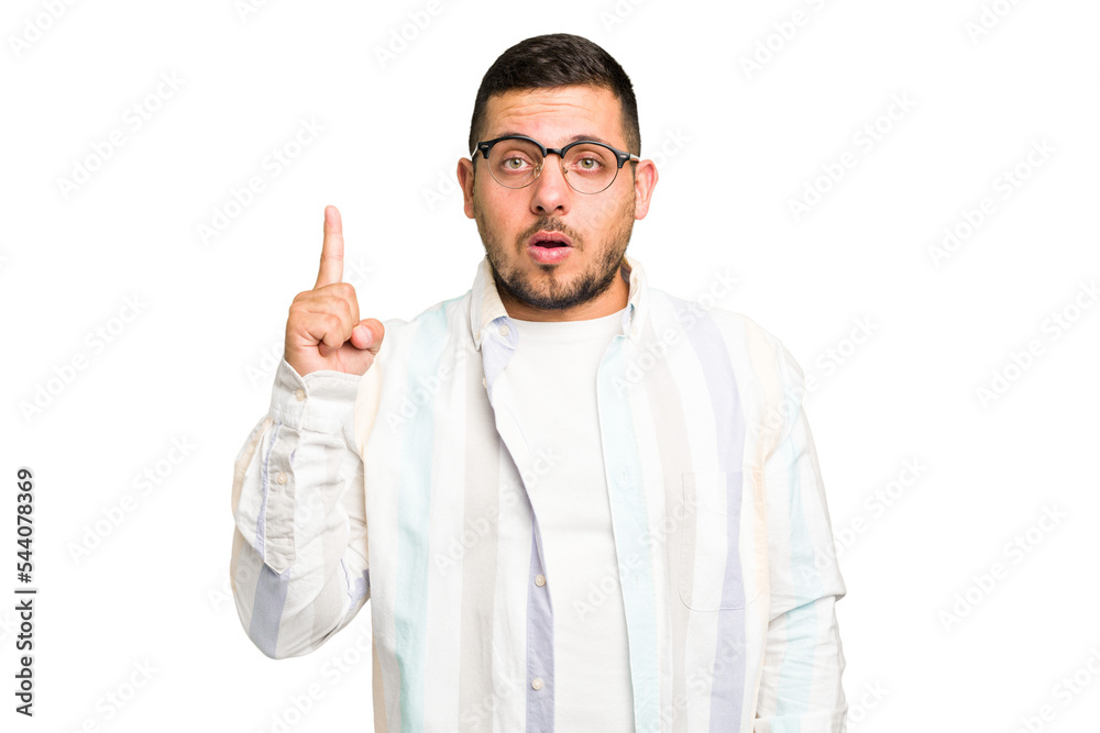 Young caucasian man isolated pointing upside with opened mouth. Young caucasian man isolated pointing upside with opened mouth.